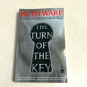 The Turn of the Key by Ruth Ware. Paperback book novel.